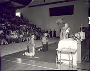 Father Timothy Crean celebrates the Eucharist with La Salle's student body during the 1968 Mass of the Holy Spirit.
