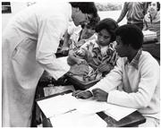 Brother Michael Dini, FSC, instructs his biology class on the proper techniques for dissection in 1980.
